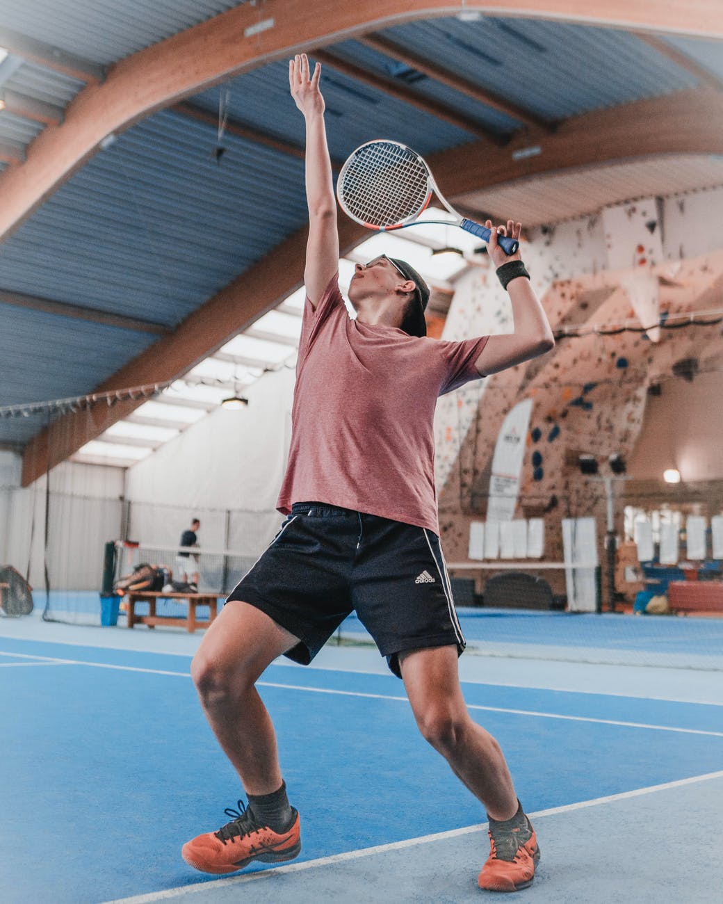 photo of man playing tennis